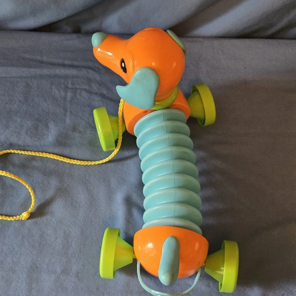 Tomy's  Marley The Musical Dog Plastic Pull Toy For Children 18M+